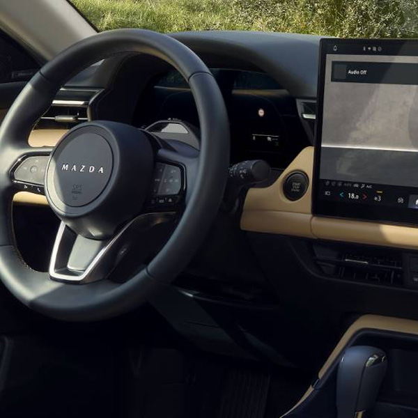 Interior of a 2026 MAZDA CX-5 with leather seats.