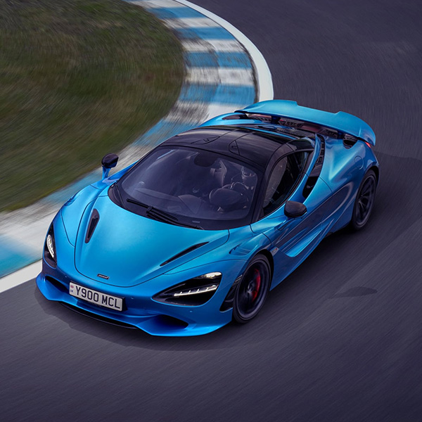 Image of a McLaren Driving.