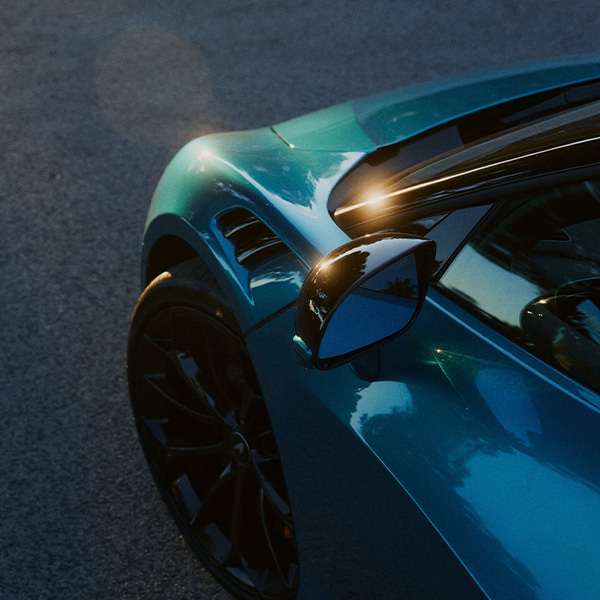 Overhead shot of the 2026 McLaren Artura side mirror and front end