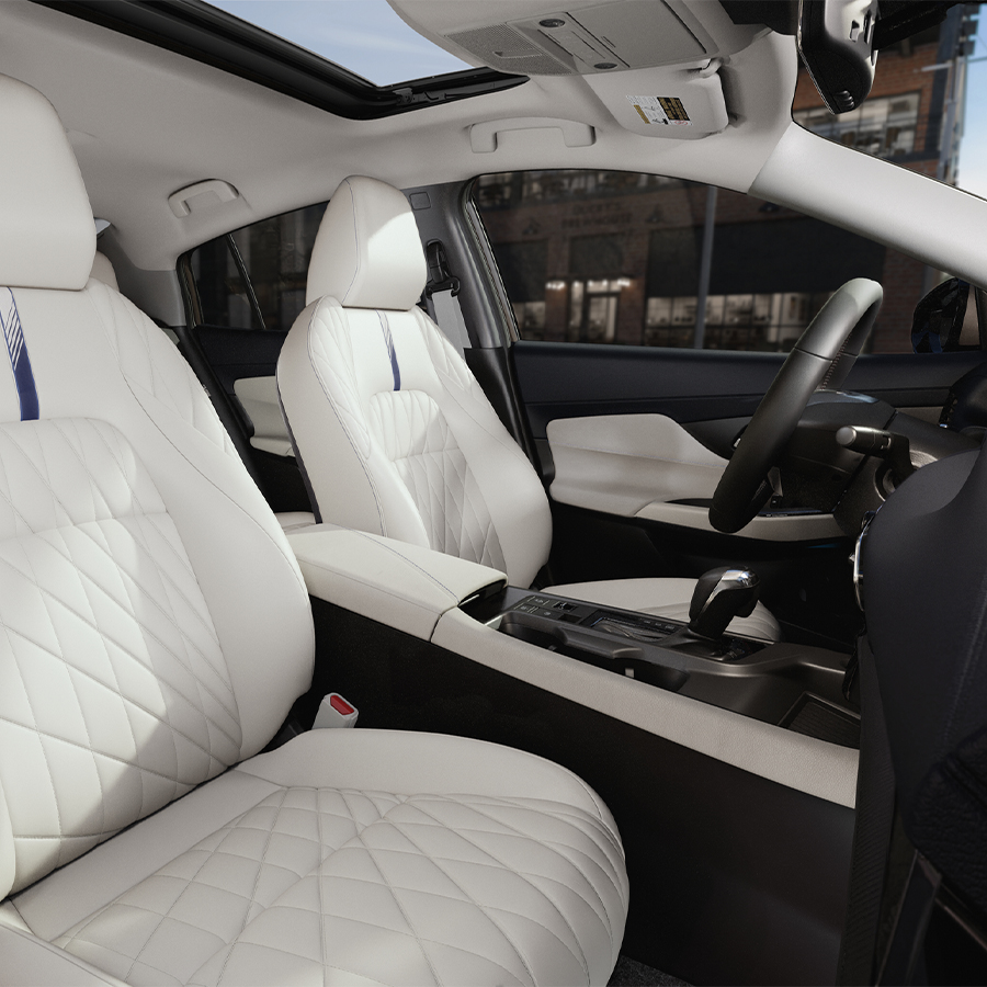 2027 Nissan Sentra side interior view of interior, comfort and convenience features.