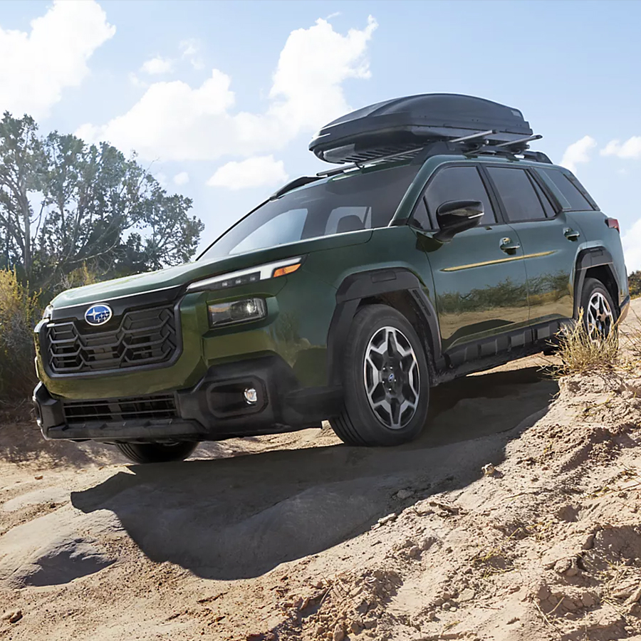 Touring shown in Deep Emerald Green Pearl with accessory equipment
