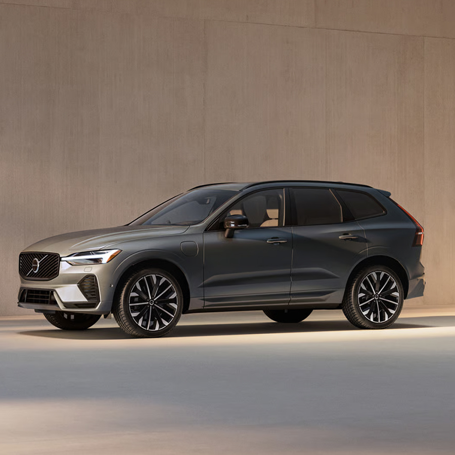 Angled front view of the Volvo XC60 midsize plug-in hybrid SUV.