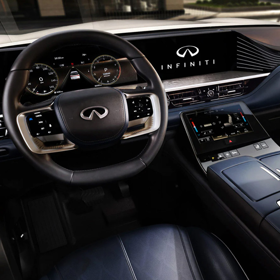 2027 INFINITI QX80 interior dashboard with driver's seat and steering wheel