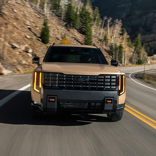 2027 Kia Telluride driving down a road