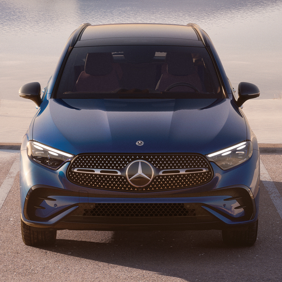 2027 Mercedes-Benz GLC front exterior view showcasing signature grille, LED headlights, and sleek luxury SUV design