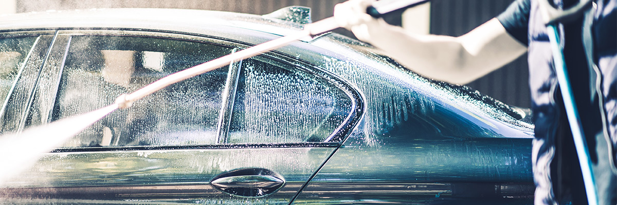 Men Washing His Car