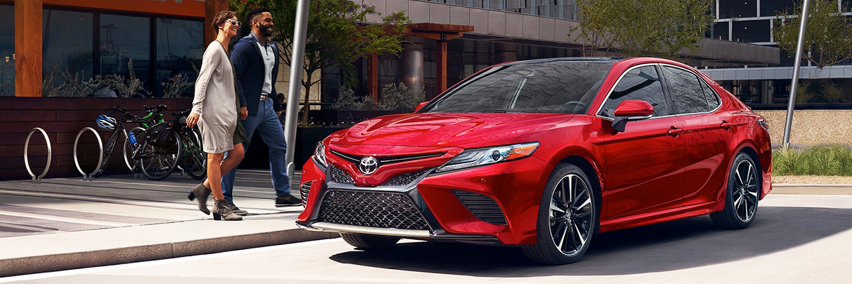 2020 red Toyota Camry being delivered