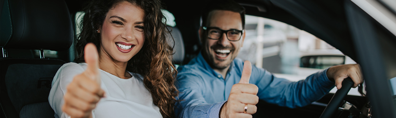 couple driving in car