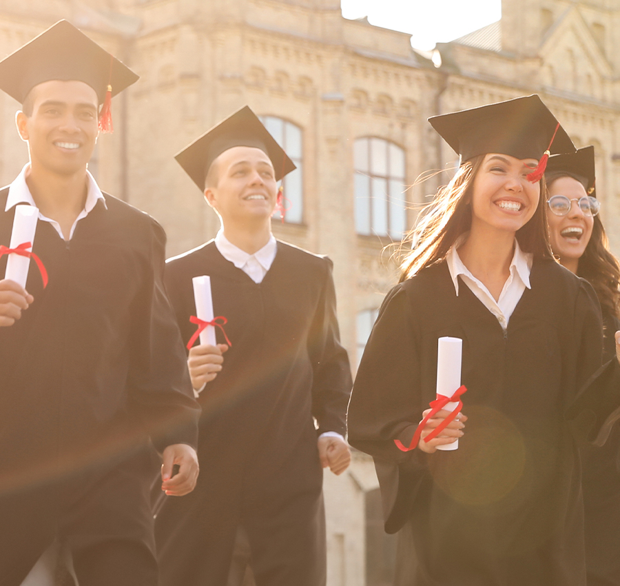 Graduates walking away from college