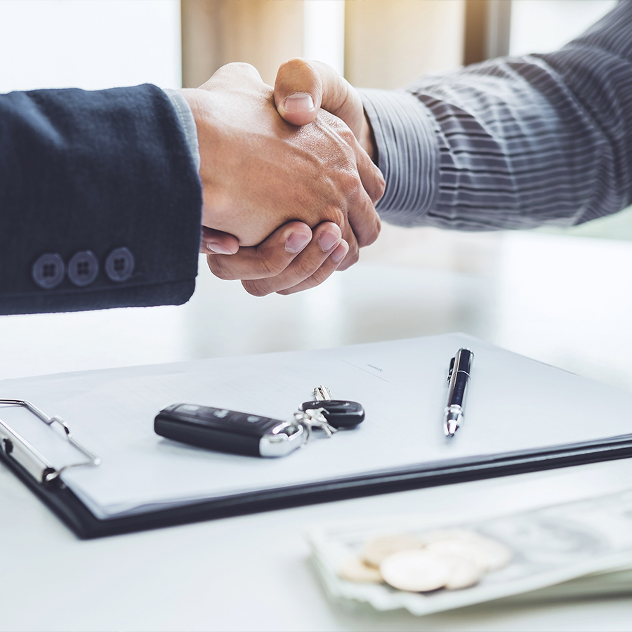 Handshake of cooperation customer and salesman after agreement