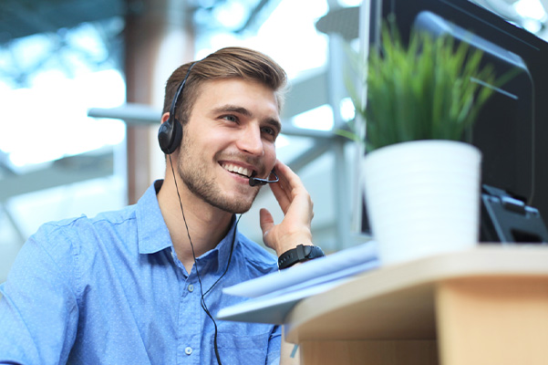 Car Salesman offering customer support over the phone