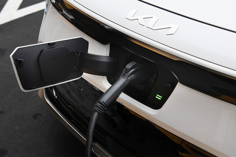 2024 Kia Niro EV Utilizing Fast-Charging At A Public Charging Station Close-Up