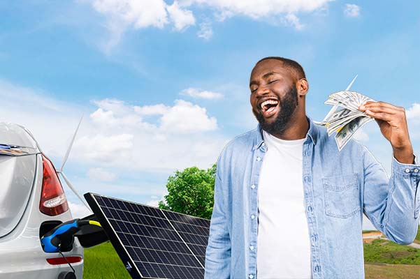 Cheerful man holding money while charging car at charge station