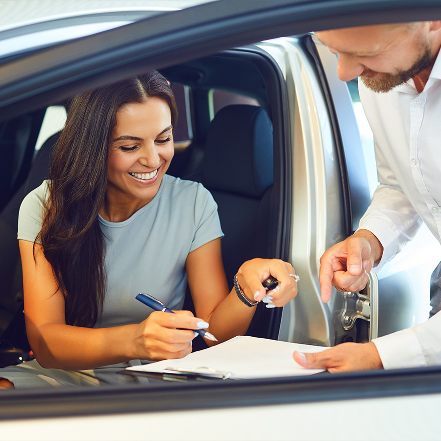 young adult buying a new car