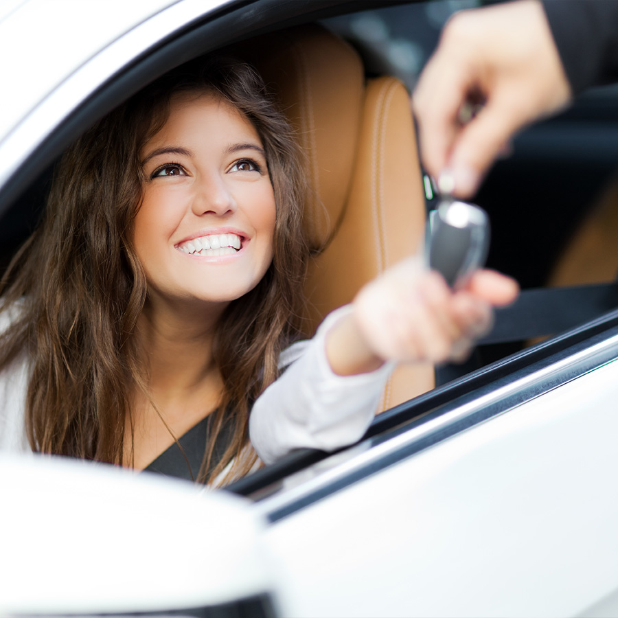 young adult buying a new car