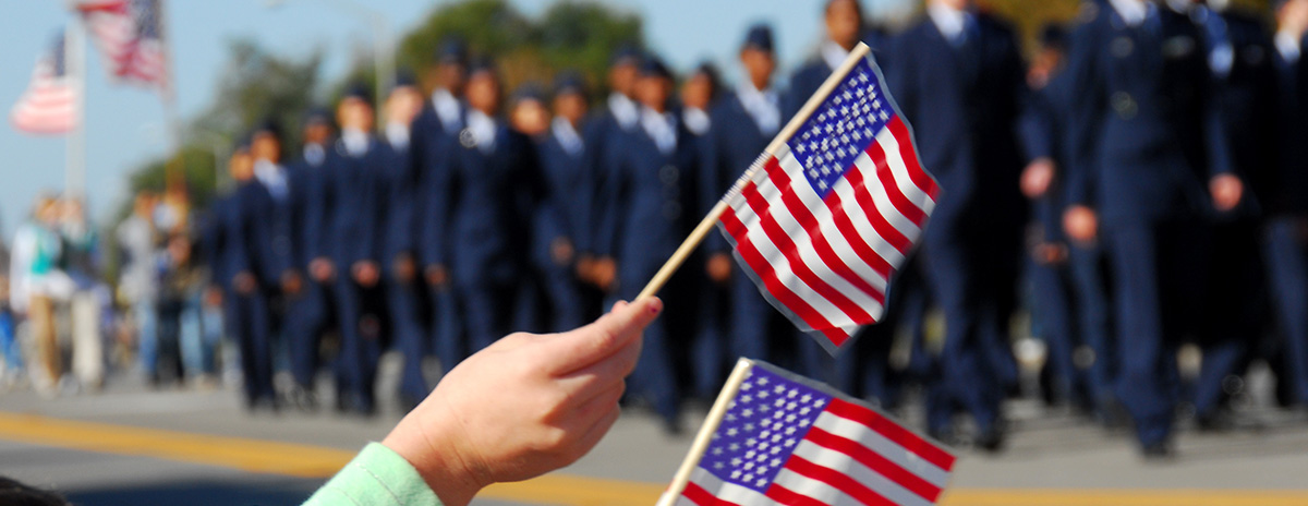 Line up of Airfoce Soldiers and American Flags