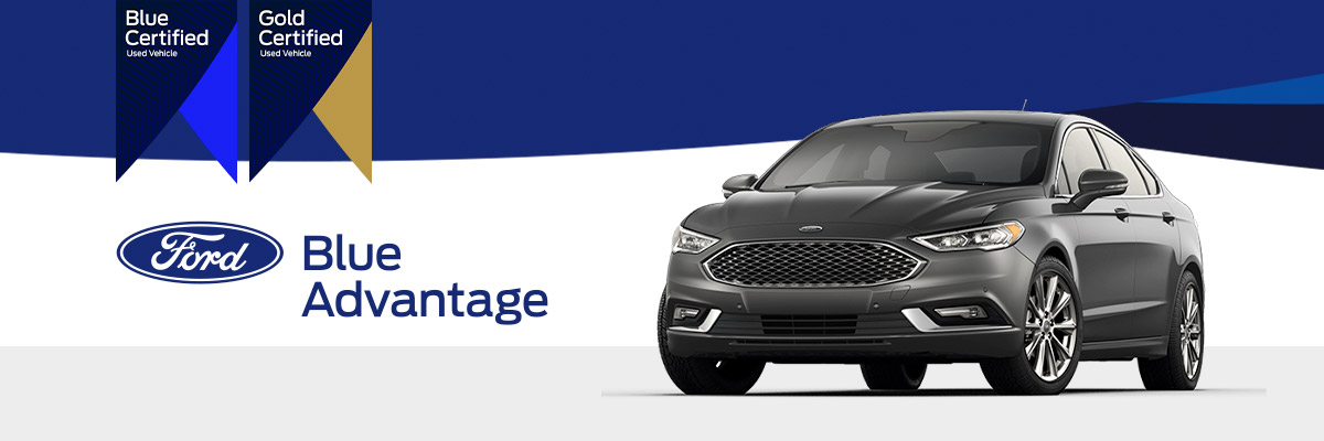 Ford Blue Advantage logo with 2018 Ford Fusion on a blue geometric background