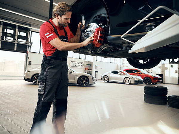 Close up of hands holding brake pads