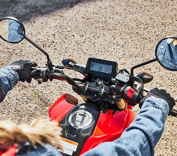 ATV racing along a moutainous road