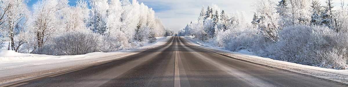 Long snowy winter road