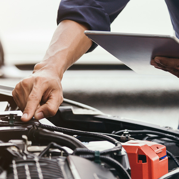Automobile mechanic repairman hands repairing a car engine automotive workshop with a wrench, car service and maintenance,Repair service.