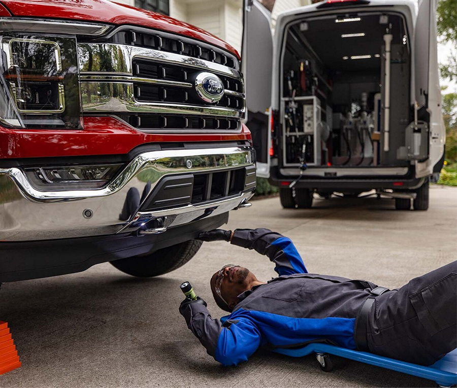Ford Mobile Service technician working on F-150