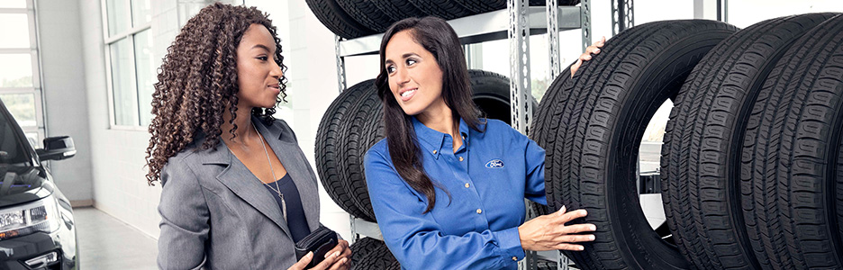 Mechanic suggesting tires