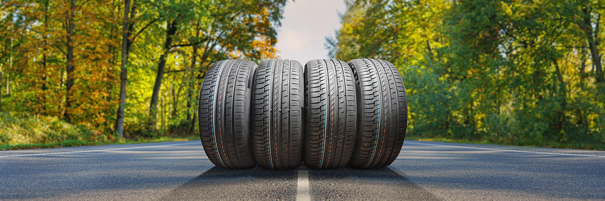 spring tires on the asphalt road in the sun - time for spring tires