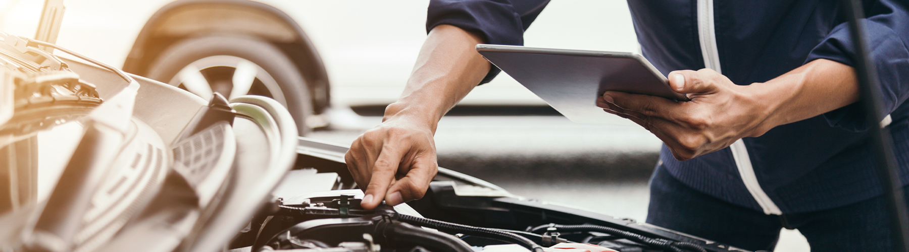 Automobile mechanic repairman hands repairing a car engine automotive workshop with a wrench, car service and maintenance, Repair service.