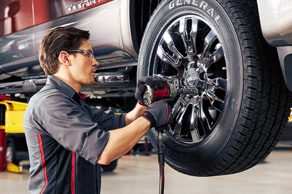 Mechanic working on tire