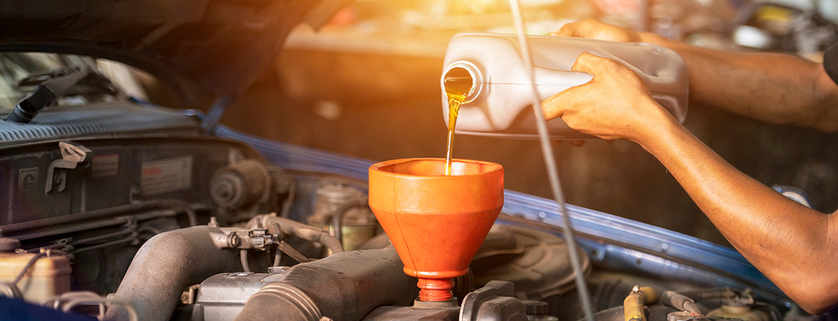 Oil change service by mechanic