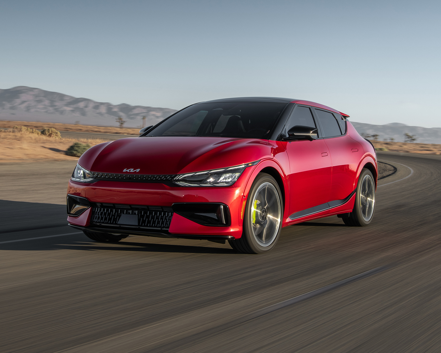 2024 Kia EV6 driving around a bend