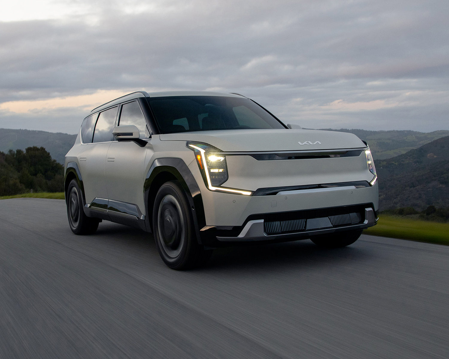 2025 Kia EV9 driving on a road