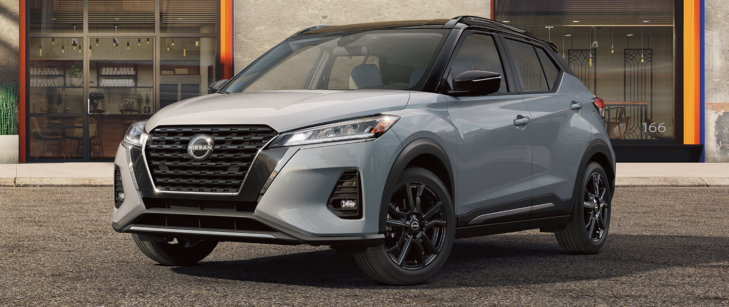 2024 Nissan Kicks parked outside of a building