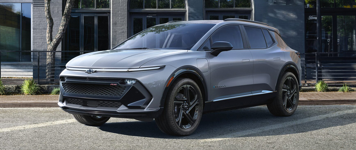 Chevy Equinox EV parked outside a building