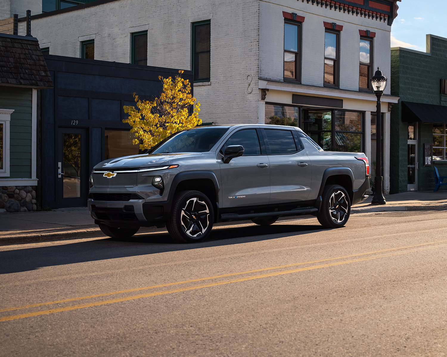 2025 Silverado EV driving down Main Street