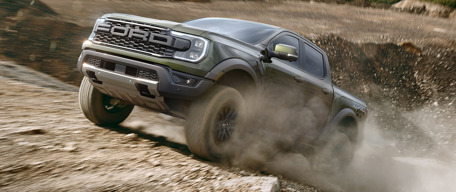 2025 Ford Ranger offroading on a rocky hill