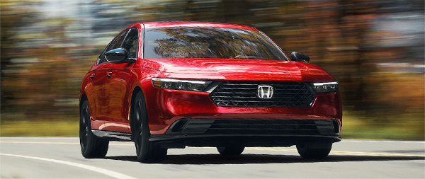 Honda Accord driving in a city