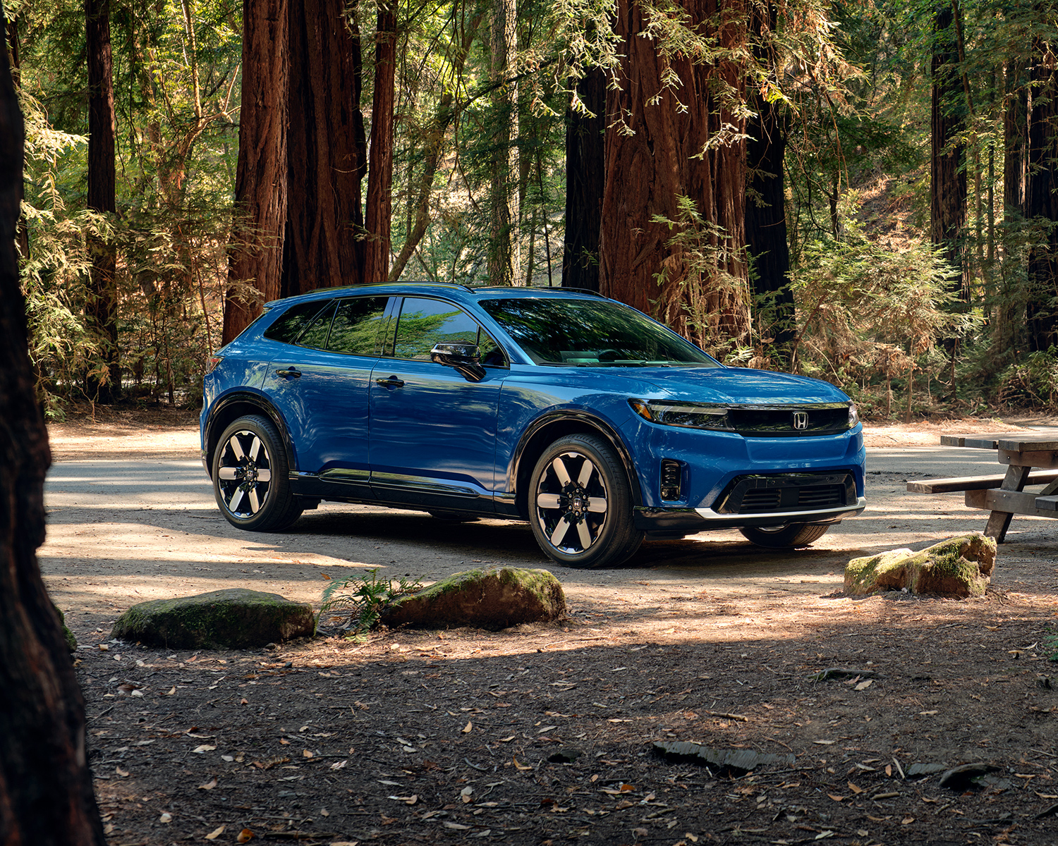 2025 Honda Prologue driving on a dirt road
