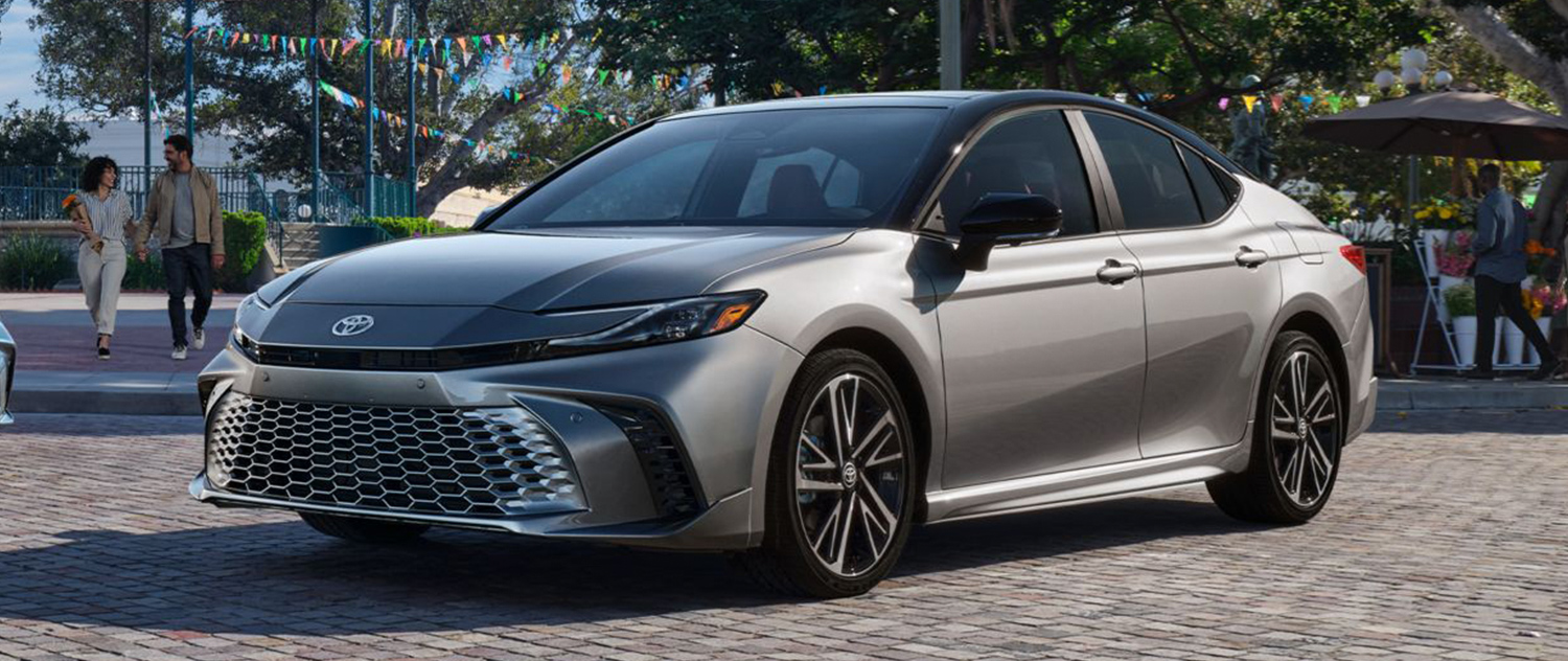 The 2025 Toyota Camry parked at a town fair