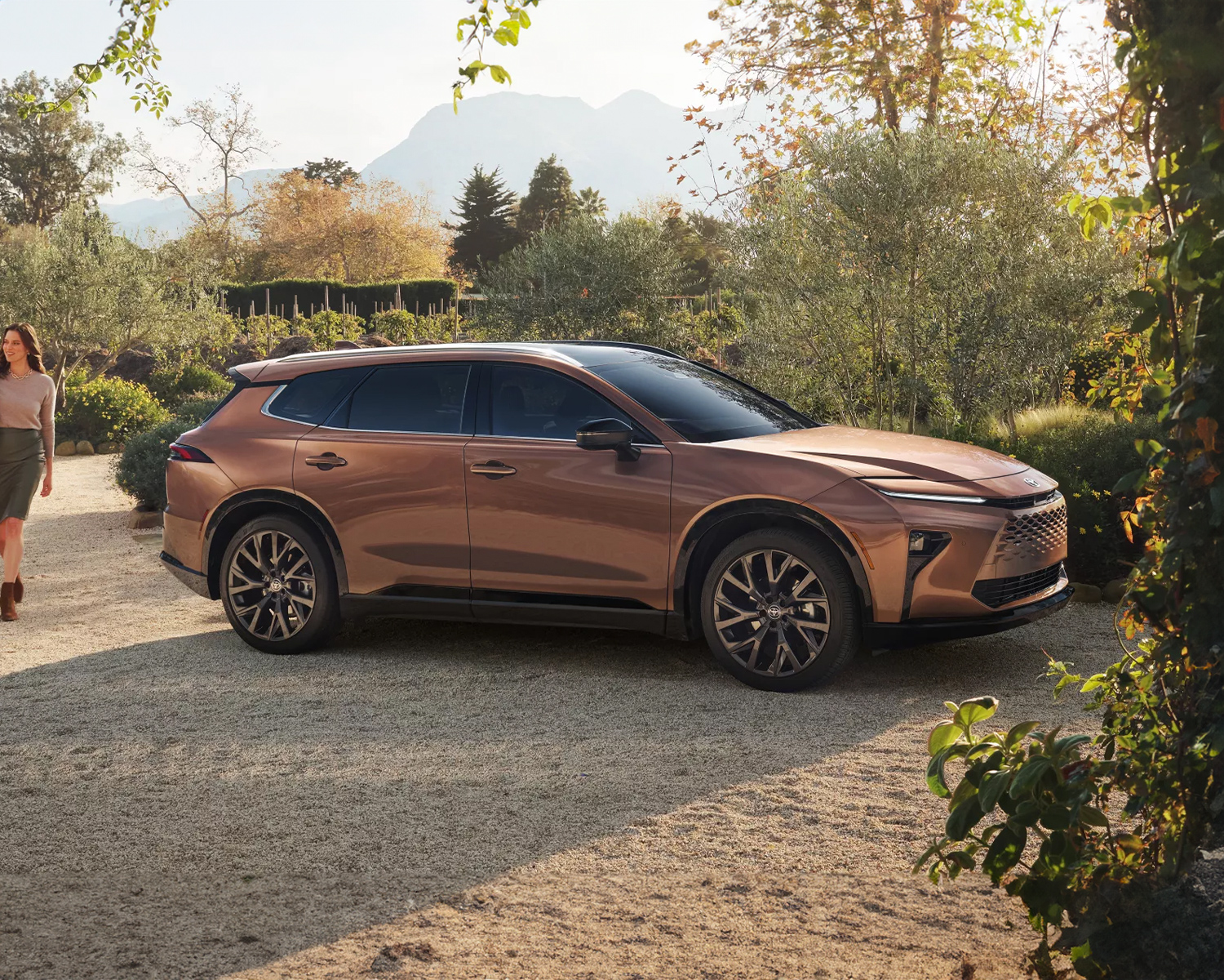 2025 Toyota Crown Signia parked in front of beautiful landscape on a sunny day