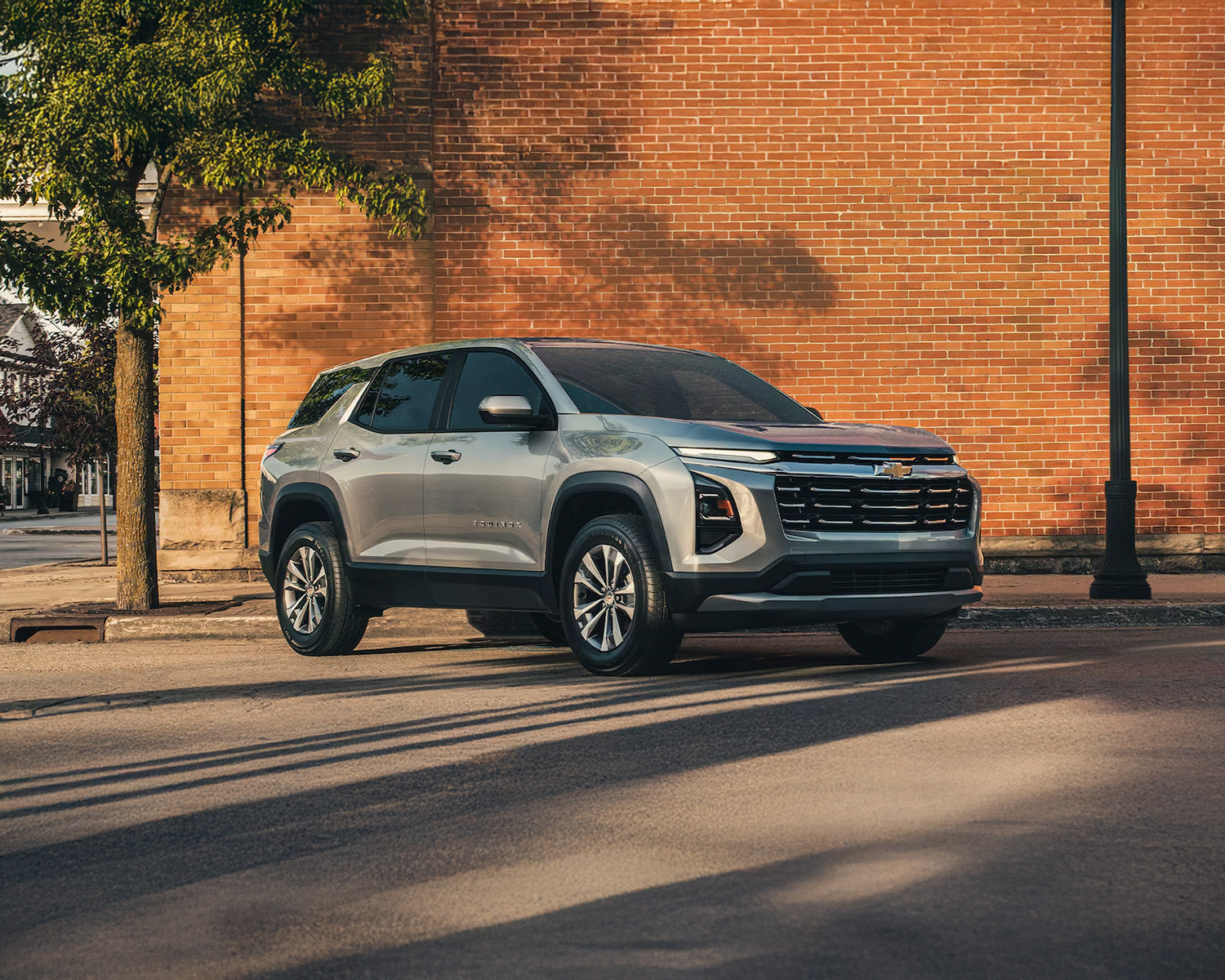 Chevy Equinox parked outside a brick building