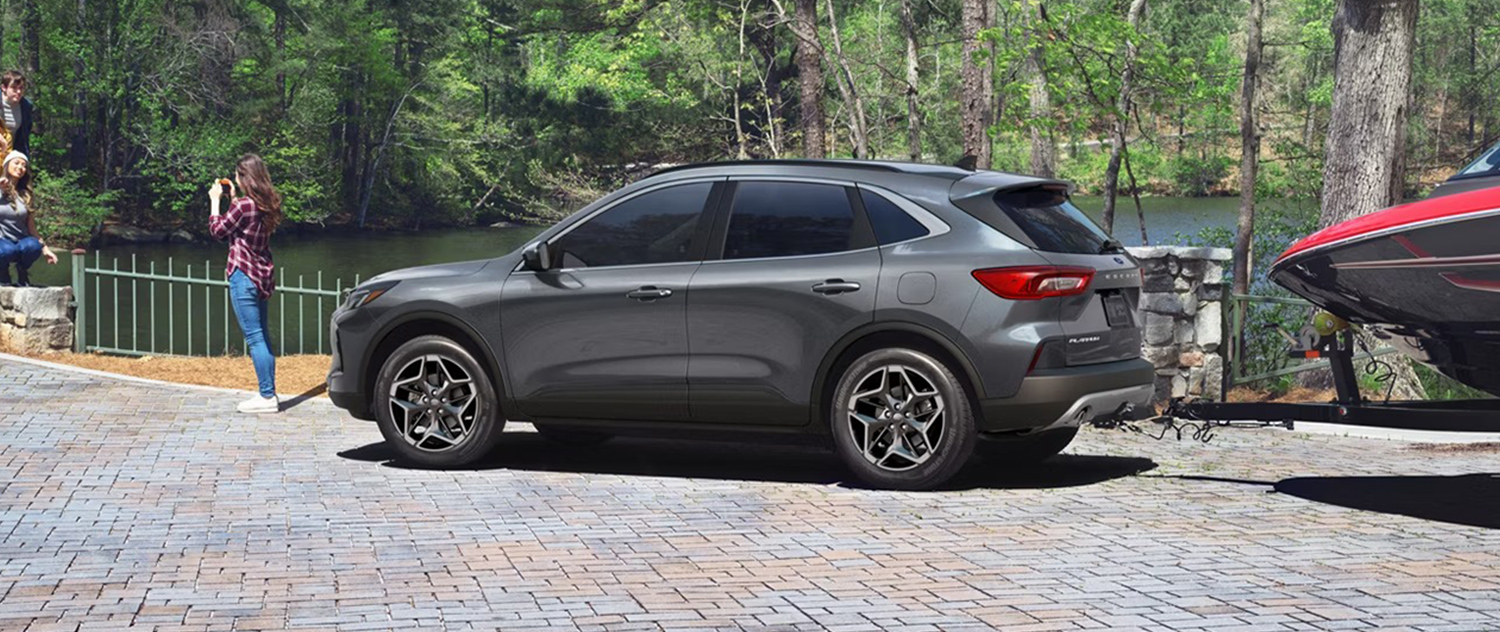 2026 Ford Escape towing a boat