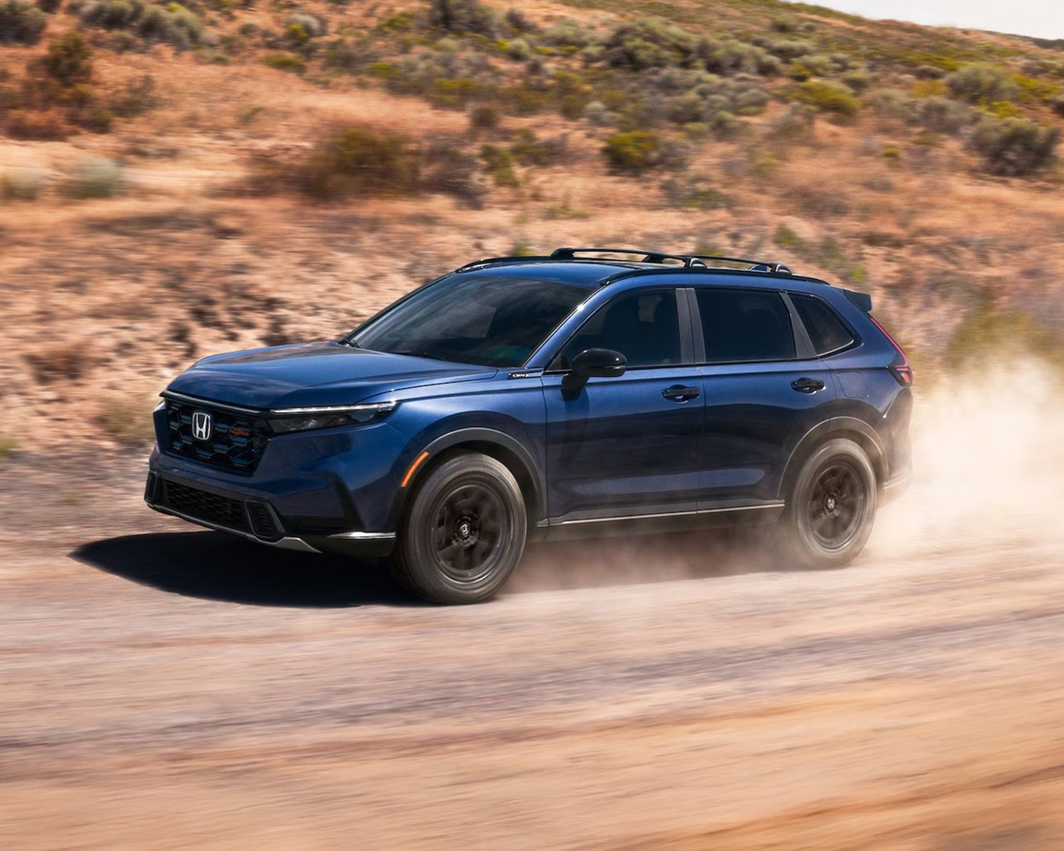 TrailSport Hybrid shown in Canyon River Blue Metallic with Honda Genuine Accessories.