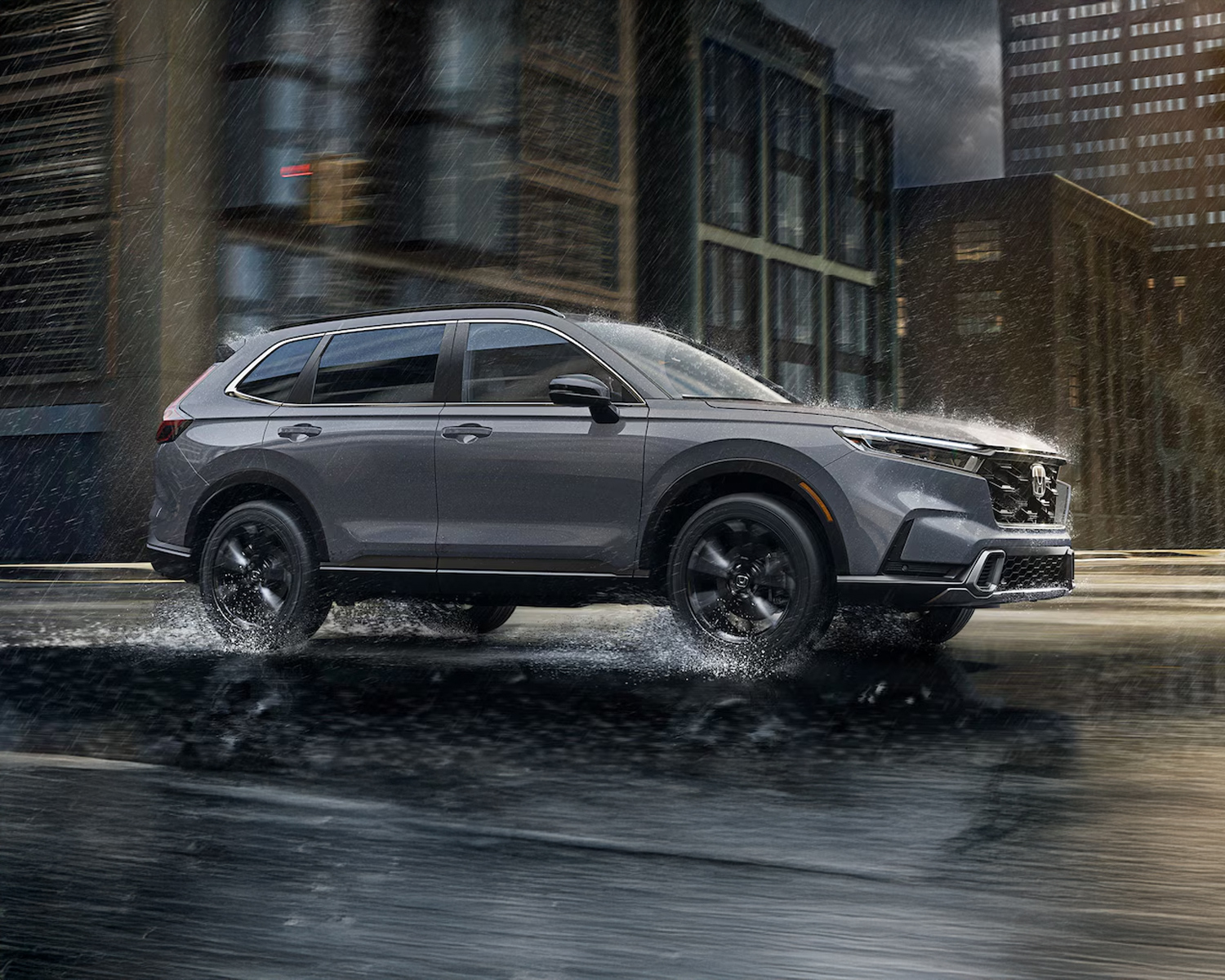 2026 Honda CR-V driving down wet city road