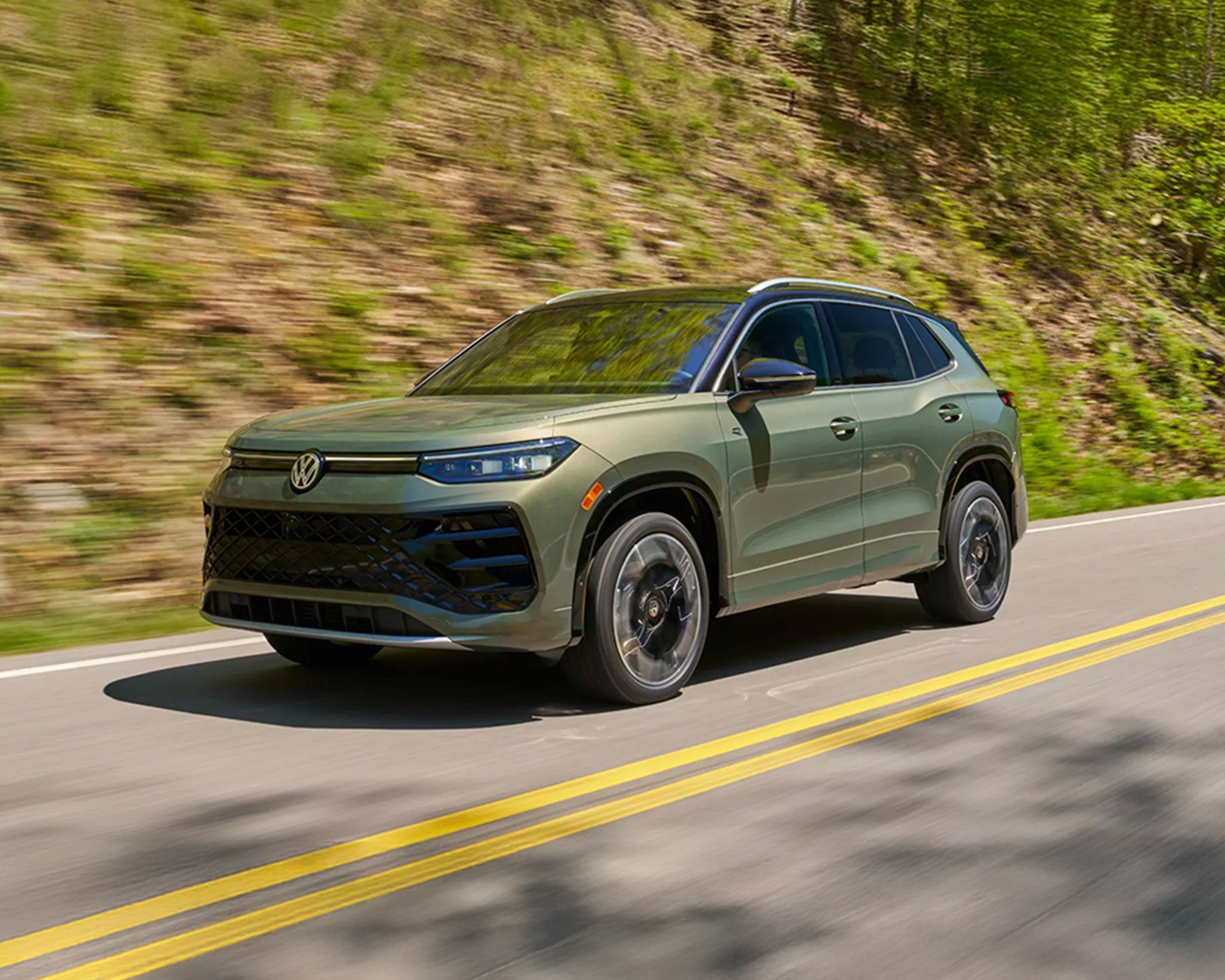 VW Tiguan driving down the street