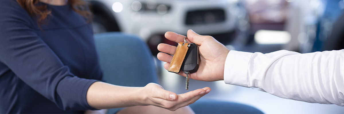 car keys being handed over