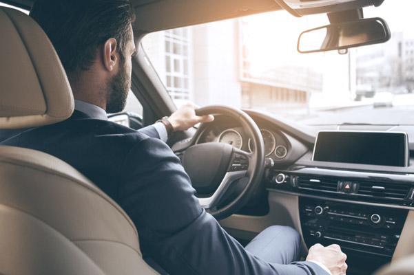 Man driving a car