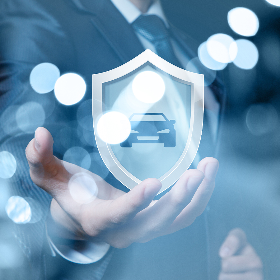 Guy holding vehicle protection crest for warranty