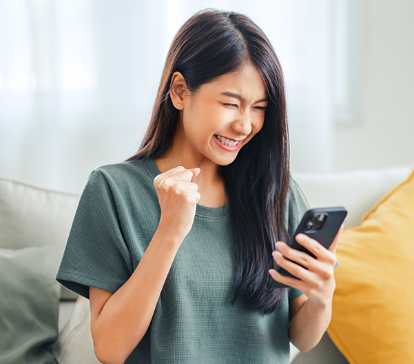 happy woman on her iphone